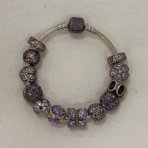 Pandora Silver and Purple Charm Bracelet. Classic barrel clasp. 6.7”